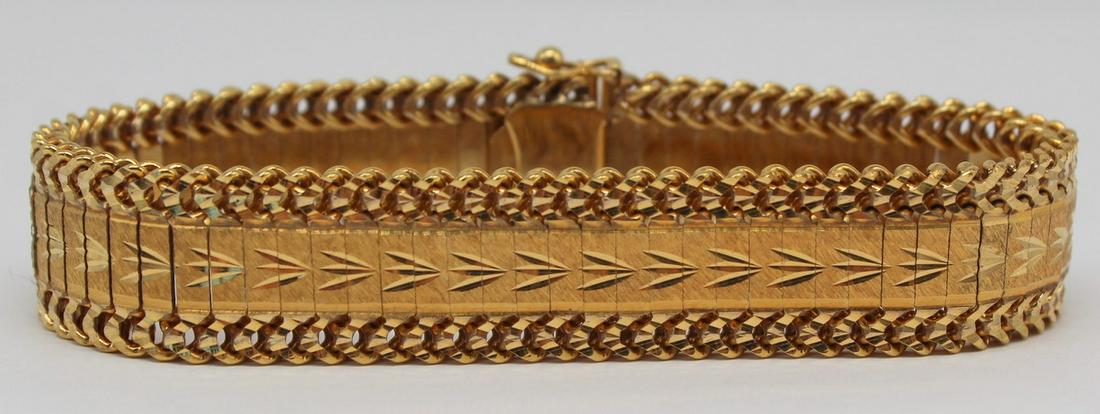 JEWELRY. Spanish 18kt Gold Articulated Bracelet.: Spanish 18kt yellow gold articulated bracelet. With domestic gold hallmark of a lion's head facing left in an oval frame-shape, for Leon, 1934-1988. Total approx. weight is 31 dwt. From a Bronx, NY es