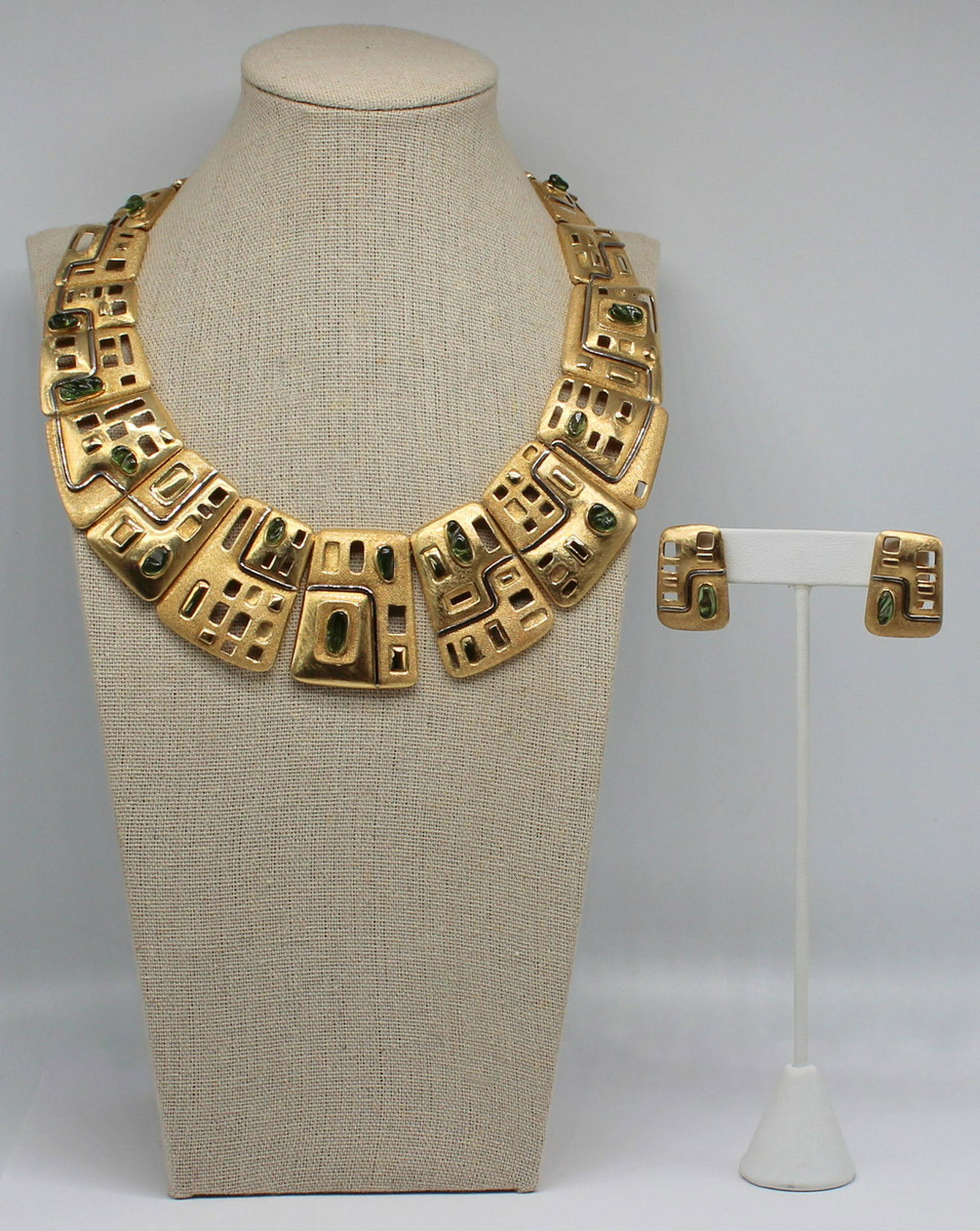 JEWELRY. Haroldo Burle Marx 18kt Gold and Polished: Gem Suite. Haroldo Burle Marx 18kt yellow gold suite including an 18kt yellow gold choker length necklace comprised of articulated open work pendants set with "forma livre" polished green to