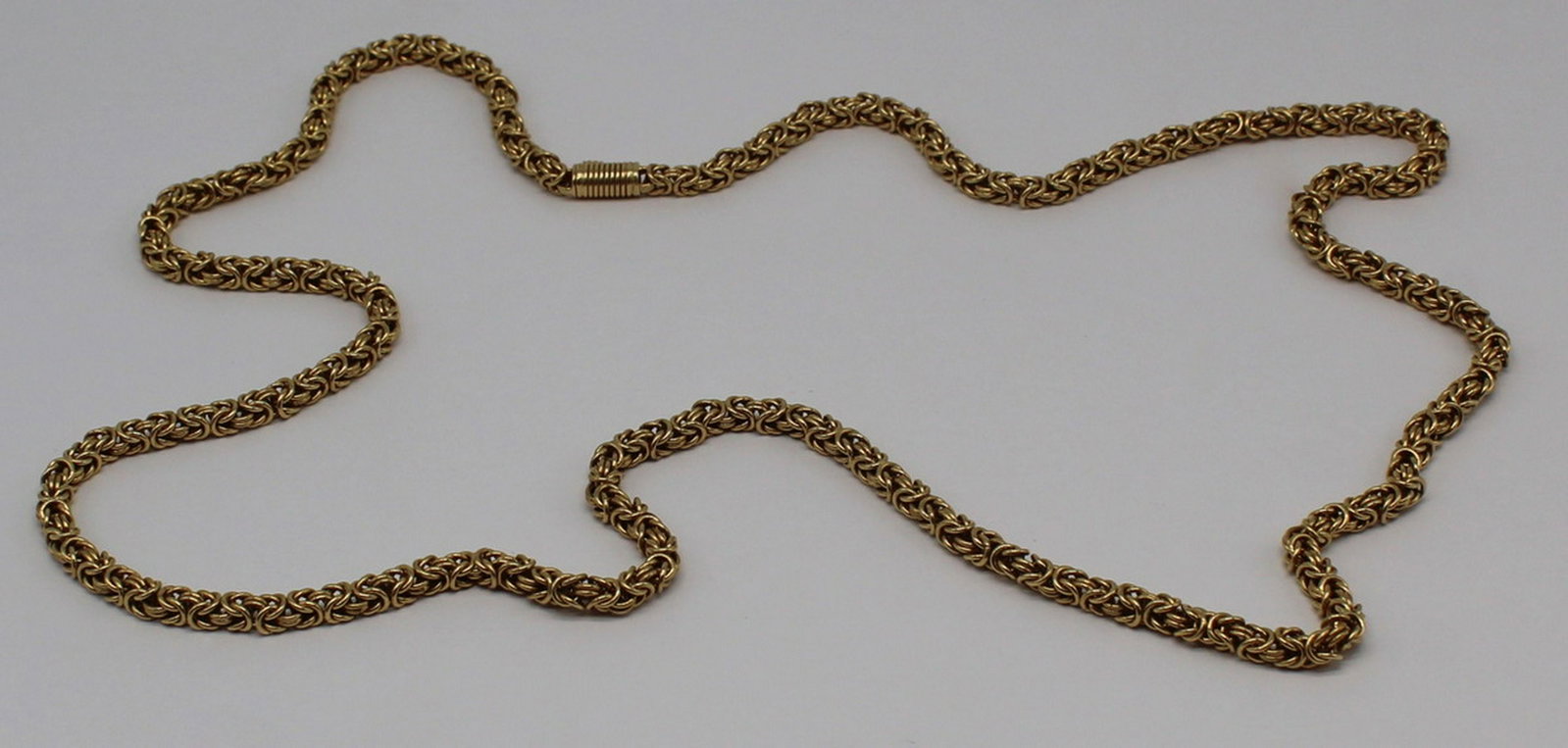 JEWELRY. Byzantine Link 18kt Gold Necklace.: Byzantine link 18kt yellow gold chain necklace. Stamped, "18K" with an unidentified maker's mark. Total approx. weight is 40.1 dwt. From a Yonkers, NY estate. Dimensions: necklace measures a
