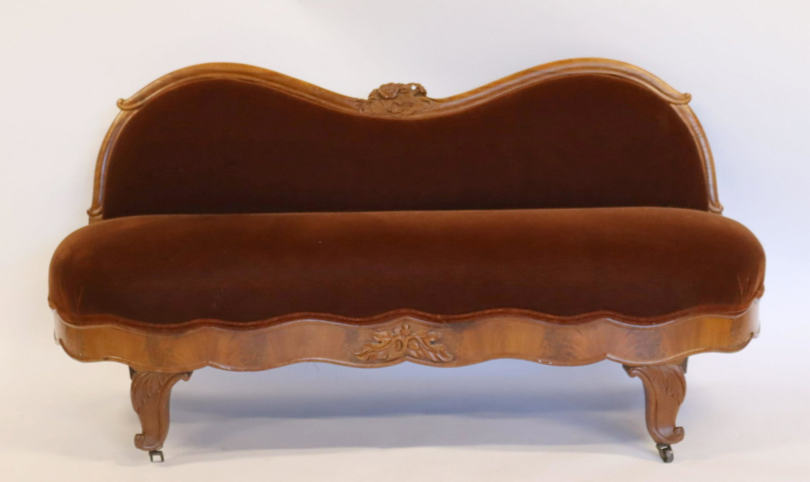 Empire Mahogany Velvet Upholstered Settee.: Great size with carvings and shaped frame. From a Greenwich, CT estate. - Dimensions: 59" x 24" x 30.5"H Please note: We have updated the item condition.