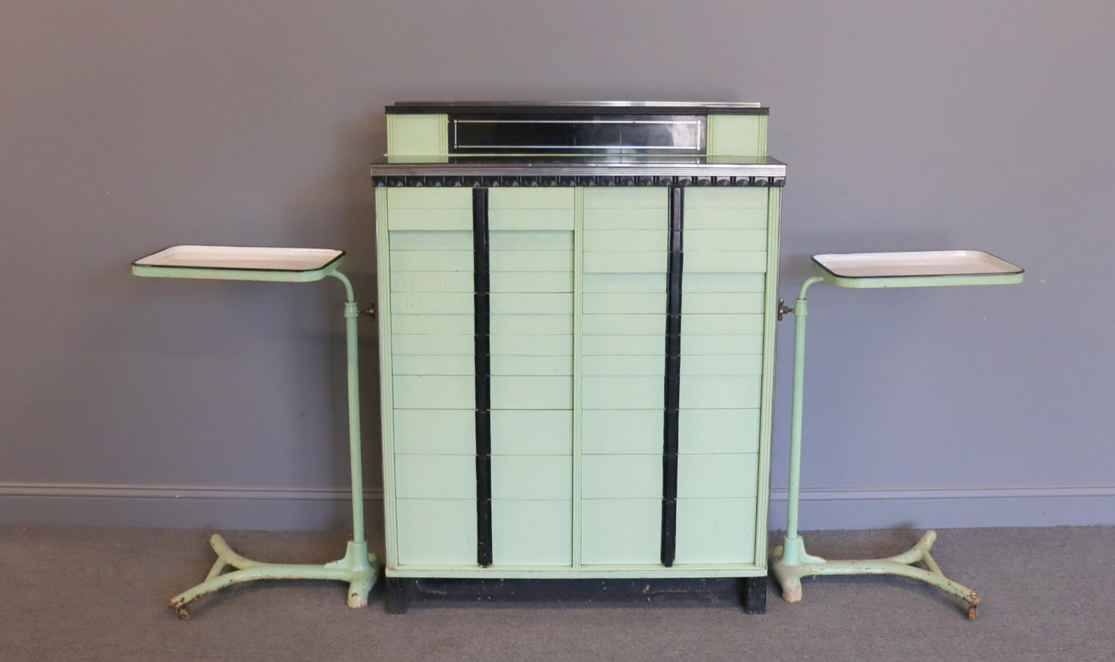 Antique All American Dental Cabinet and Matching: Tray Stands on wheels. Art Deco good Quality Cabinet multi drawers and pull outs sections. From a Scarsdale NY Estate. Tray stand 24"w x 34"h - Dimensions: 38"w x 15"d x 50"h cabinet