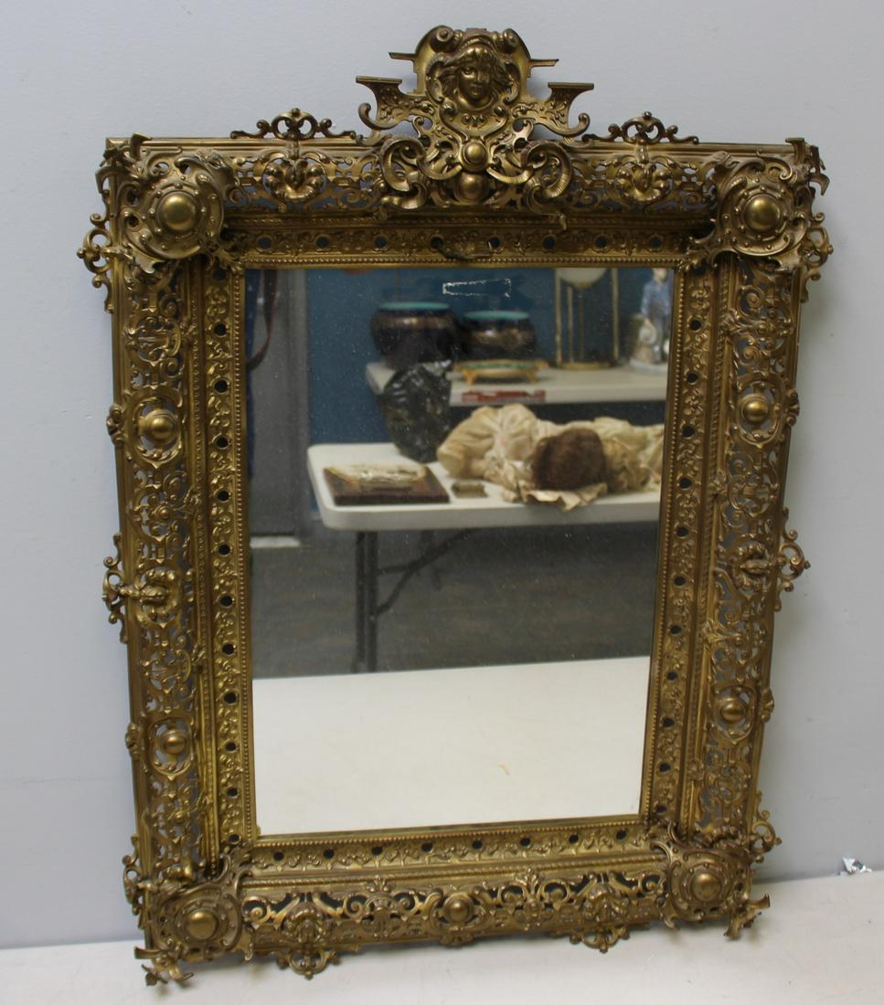 Antique Rococo Brass Mirror With Figural Crown.: Nice quality, original patina and from a Westchester estate. - Dimensions: 32" x 23"