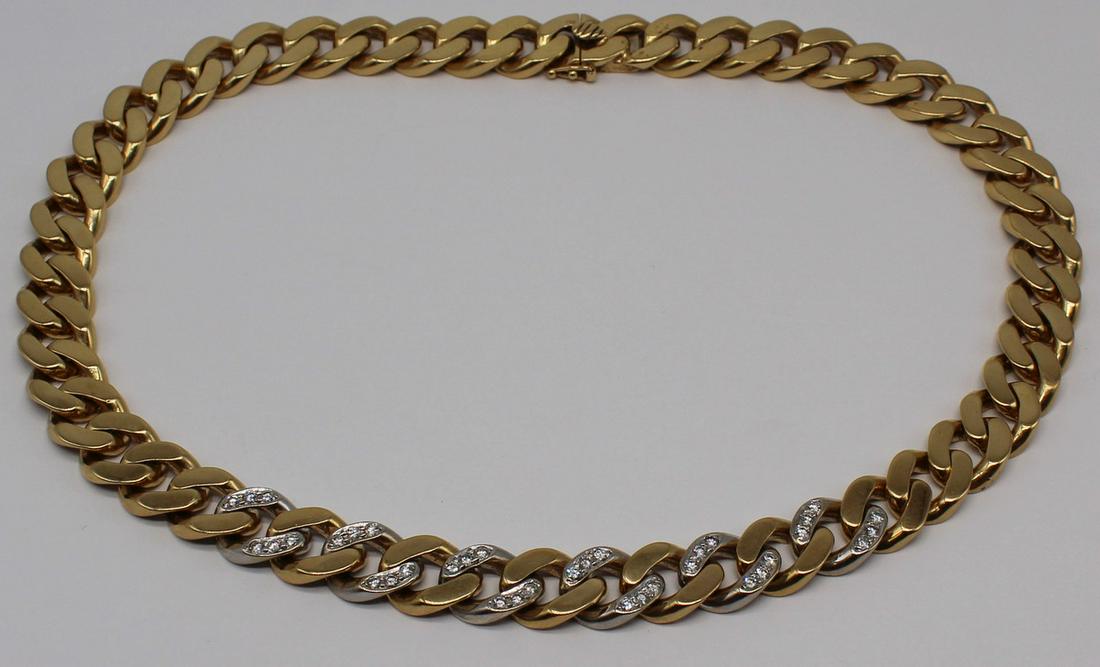 JEWELRY. Bi-Color 18kt Gold and Diamond Chain.: Bi-color 18kt yellow and white Cuban link chain necklace. Six (6) links inlaid with diamond accents - total of (36) round brilliant cut diamonds measuring approx. 2mm each; total approx. weight of 1ct