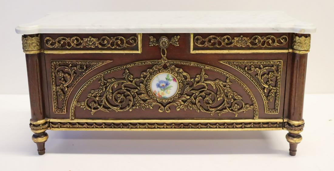 Fine Quality Bronze Mounted Louis XV1 Style: Miniature Commode. Nice commode signed on the base with all over mounts and porcelain plaques. From a Rye estate. Dimensions: 15.25" w x 5.75" d x 7.5" h