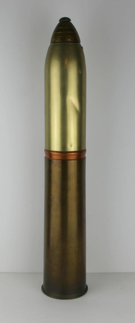SILVERPLATE. Gorham Artillery Shell Cocktail: Shaker. Gorham Artillery Shell cocktail shaker comprised of copper, brass and silver-plate; circa 1918. Replicating a World War I 18 lb Shrapnel case. Inscribed to underside, "Fac-Simile Eighteen