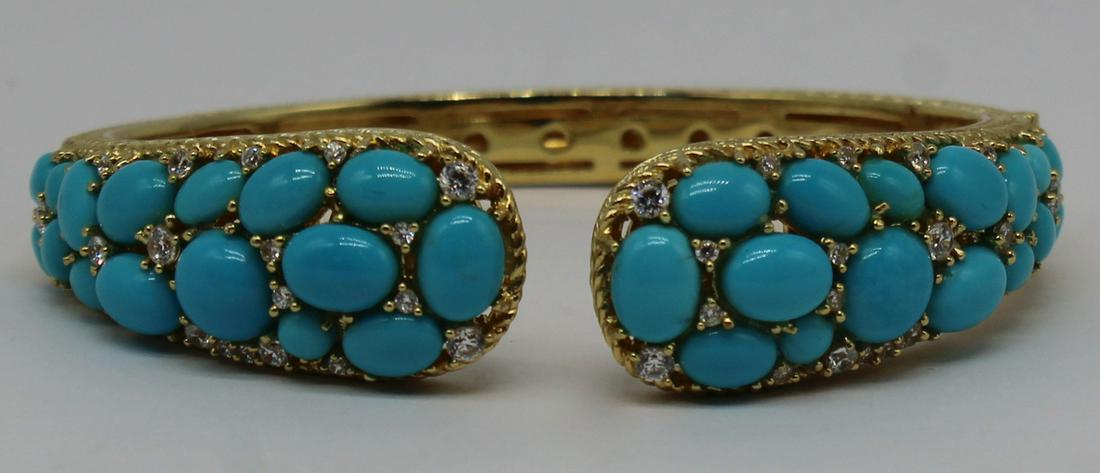 JEWELRY. Judith Ripka Gilt Sterling Bracelet.: Judith Ripka gilt sterling hinged bracelet inlaid with various faux turquoise cabochons interspersed with faceted faux diamonds. Stamped to interior of bracelet, "Judith Ripka 925 C2 Thailand&quo