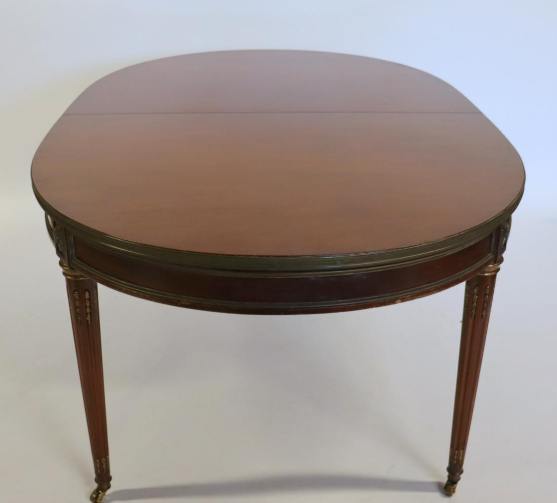 Fine Quality Louis Philippe Style Bronze Mounted: Table In The Style Of Jansen. A great size with 2 leaves. From a Rye estate. Dimensions: 68.5" x 43" x 29.5" h