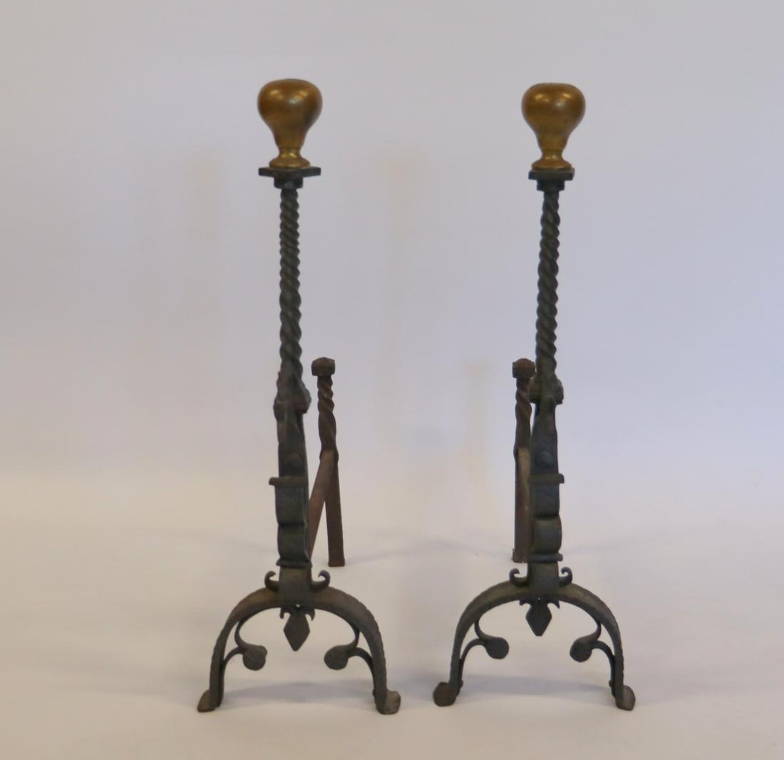 Pair Of Wrought Iron Andirons Attributed To: Samuel Yellin. From a Stamford, CT estate. Dimensions: 8.5" w x 25.5" d x 30" h