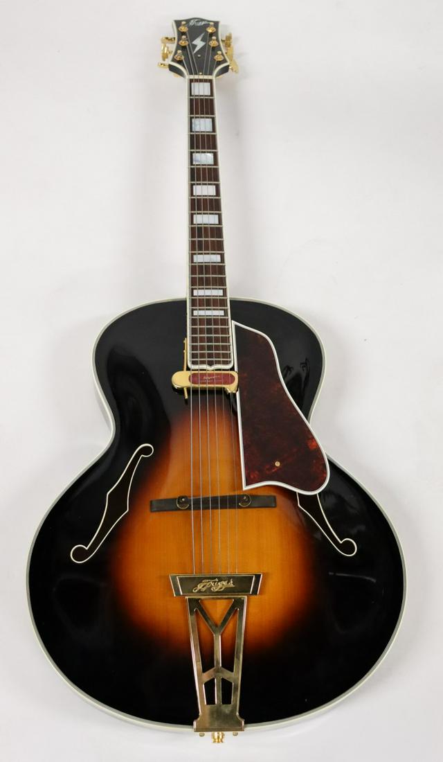 JIM TRIGGS Signed Guitar With Case.: Beautifully crafted instrument. Signed by Jim Triggs and Ryan Triggs. Serial number 01282014. From a Hudson, NY estate. - Dimensions: Case: 45.5" x 20" x6.75"h; Guitar: 42"L