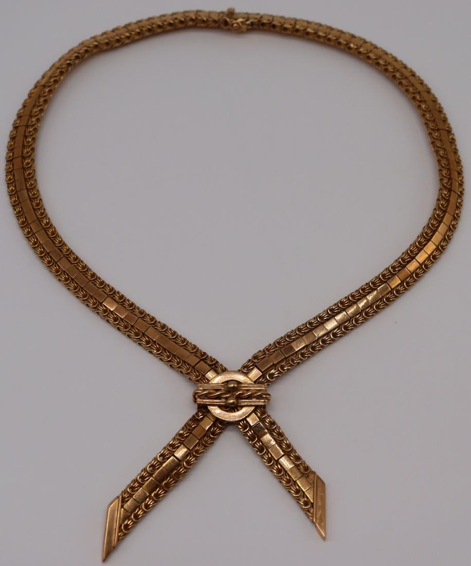 JEWELRY. Vintage Argentinian 18kt Gold Necklace.: Argentinian 18kt gold articulated necklace with ribbon form crossover pendant and closure. Stamped, "Industria Austria 750" with an unidentified pictorial hallmark. Total approx. weight is 3