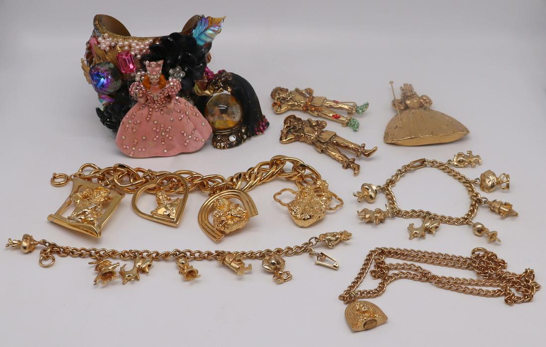 JEWELRY. Wizard of Oz Jewelry Inc. Wendy Gell.: Includes a signed Wendy Gell 2015 cuff bracelet with Glinda the Good Witch; a signed Wendy Gell Dorothy pendant on a possibly original unsigned gilt chain necklace; a signed Wendy Gell 1989 Turner bro
