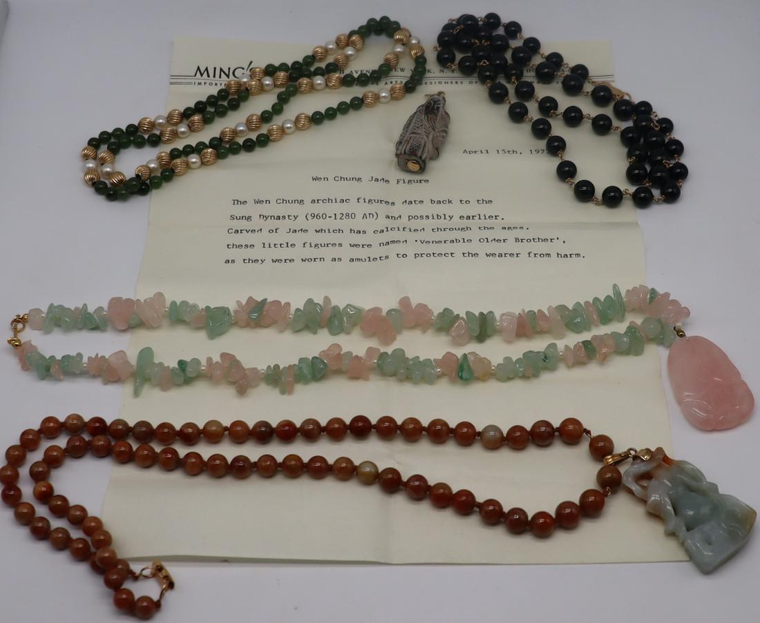 JEWELRY. Assorted Asian Jewelry Inc Wen Chung Jade: Figure. Includes a Ming's 14kt yellow gold mounted carved jade figure accompanied by a Ming's April 15th, 1977 description stating, "Wen Chung Jade Figure, The Wen Chung archaic figures date back