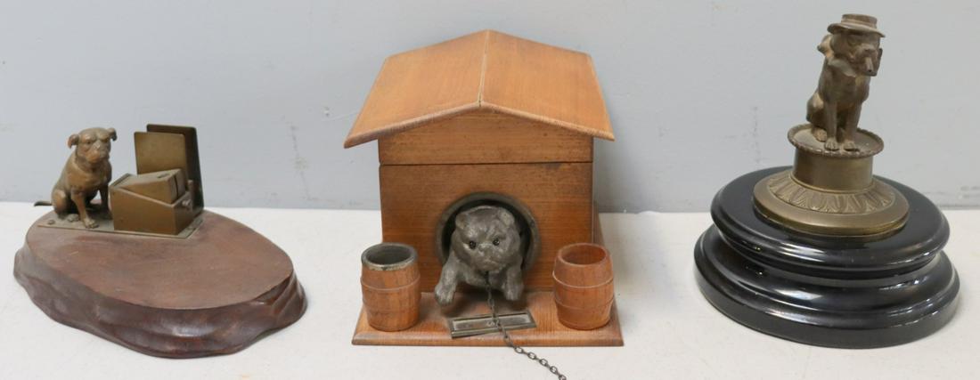 Bull Dog Humidor, Dog In Hat Lighter & Dog: Cutter. Dimensions: Humidor (6" x 7.25" x 5.5" h), Lighter (6" dia x 7.25" h), Cutter(9" x 5" x 4" h). From the estate of Jerry Terranova, author of "Antique Cigar Cutters & Lighters" and "Great Cigar