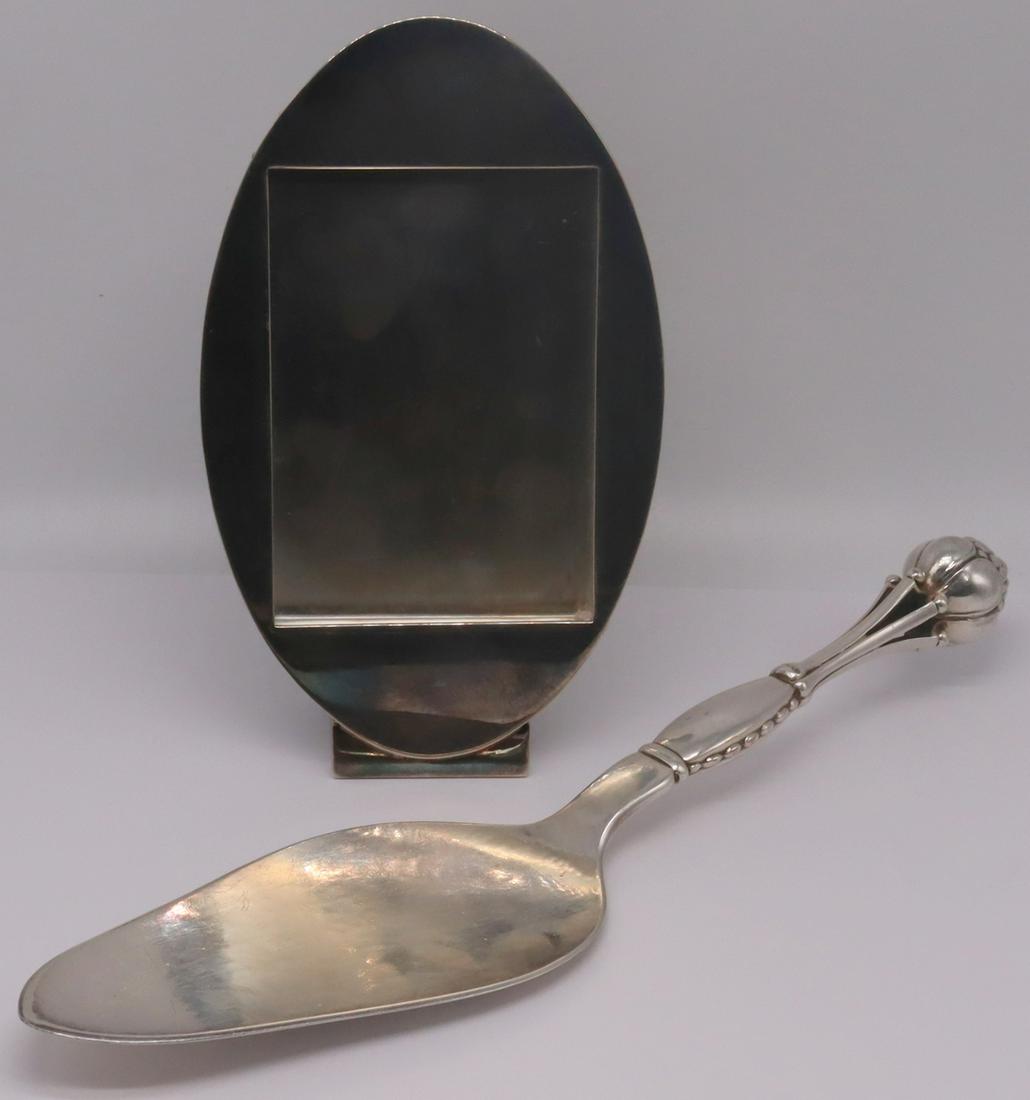 SILVER. Georg Jensen and Swid Powell Decorative: Items. Includes a Georg Jensen sterling serving piece, no. 38. Accompanied by a Swid Powell and TsAO & McKown silver-plated frame, stamped, "© Swid Powell TsAO & McKOWN Made in Argen