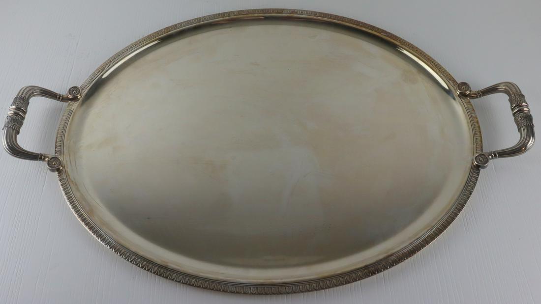 SILVERPLATE. Christofle Silverplate Serving Tray.: Christofle silverplate serving tray with acanthus leaf border, and ribbed handles with circular florets. Stamped, "Christofle" with additional stamps. From a Scarsdale, NY estate. Dimensions