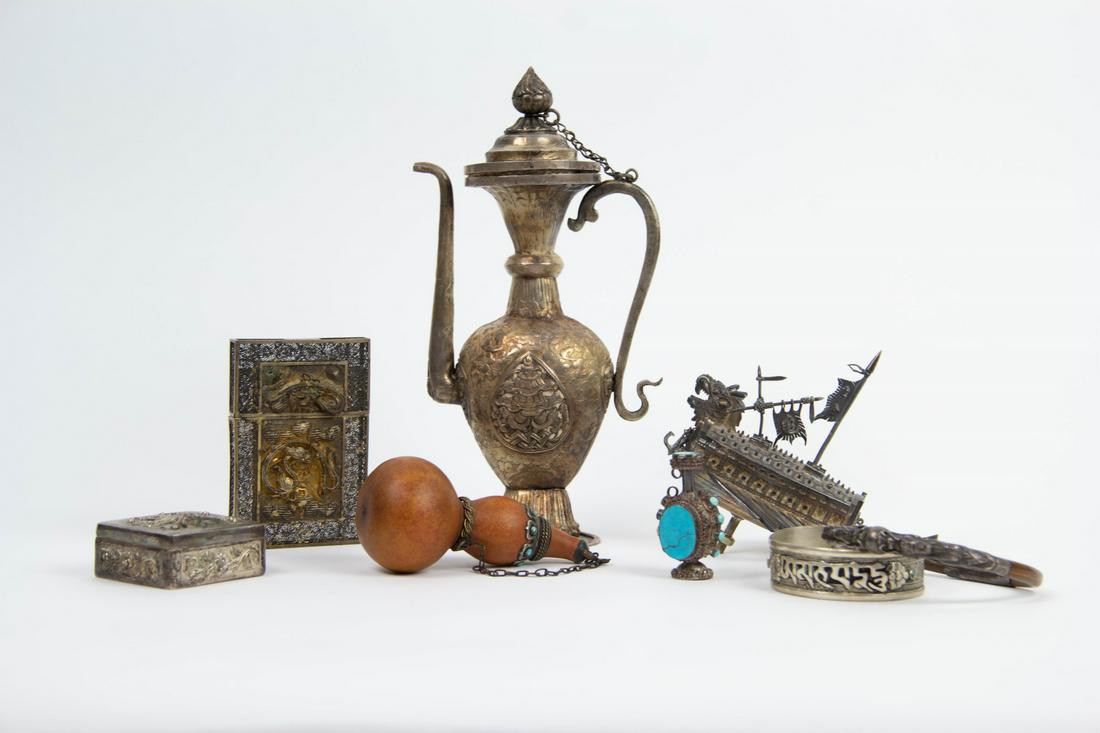 Group of Chinese & Tibetan Silver & Metal.: Including a Tibetan ewer, two snuff bottles, two bangles, a small model junk ship, a dragon-decorated card reticulated card case, and a small square box. From a Scarsdale, NY estate. - Dimensions: Ewe