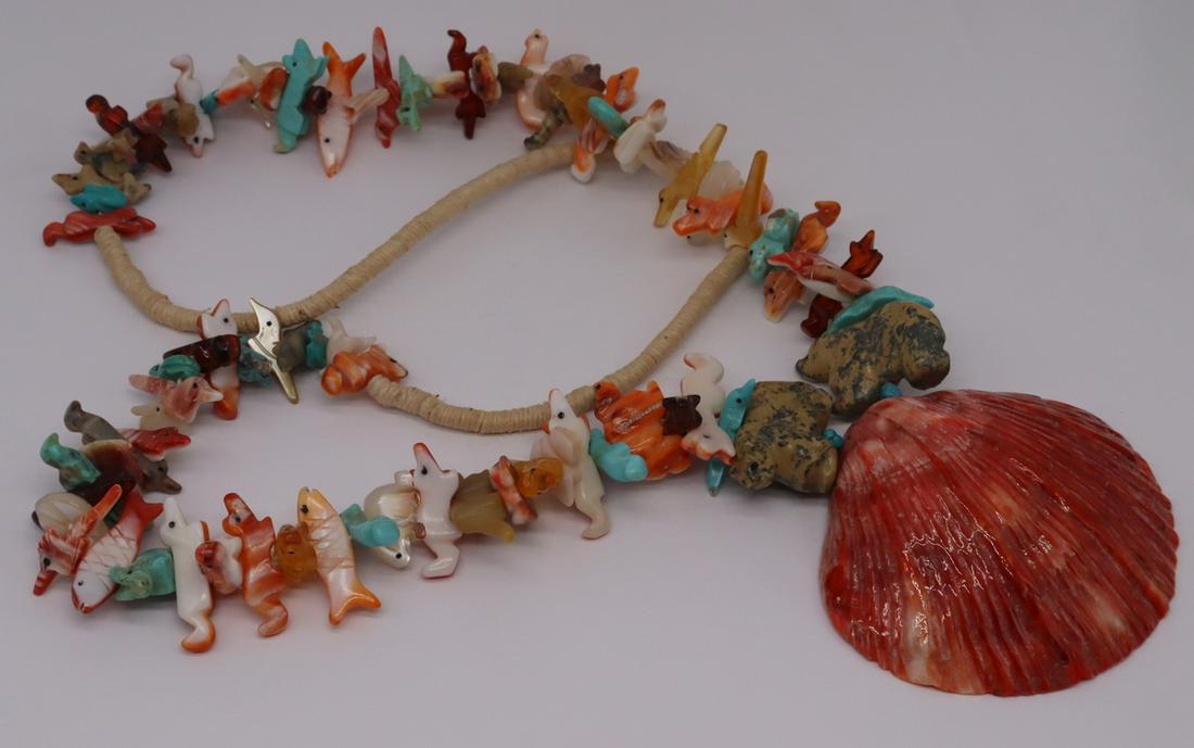 JEWELRY. Native American Fetish Necklace.: Native American "stack on stack" fetish necklace comprised of fish, foxes, bears, and birds carved from turquoise, abalone, spiny oyster shell, gold lip mother of pearl, etc. Beautiful spiny