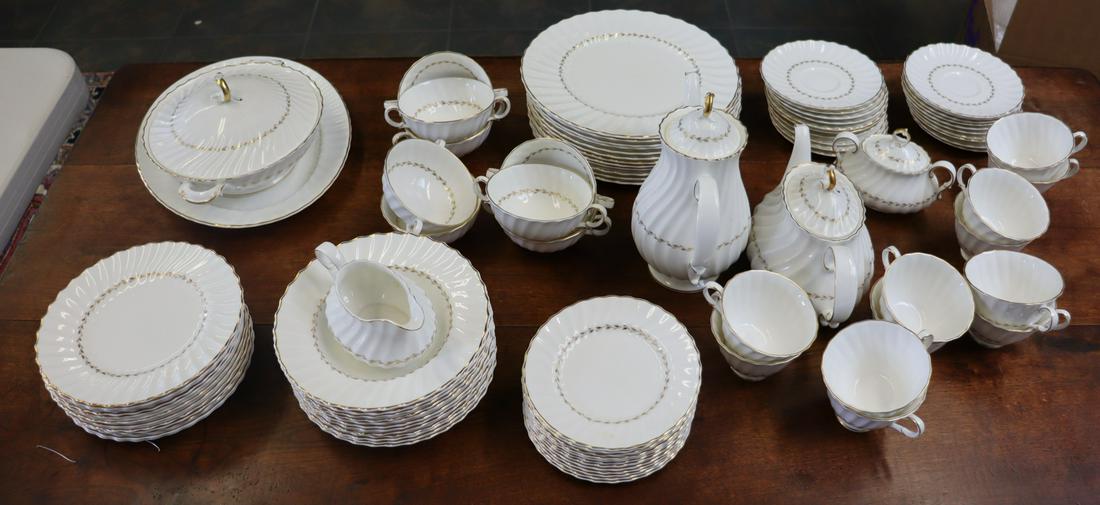 Royal Doulton "Adrian" Porcelain Service.: To include 12 plates (10.5"), 12 plates (8"), 12 plates (6.5"), 12 bowls (8"), 28 saucers (6"), 8 Two handled cups (4.5" dia), 12 cups (4" dia.), 1 lidded tureen (11"), 1 platter (13.5"), 1 creamer (5