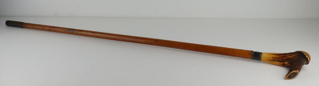 Antique Sword Stick with Bone Handle.: Antique sword stick with bone handle and silver collar. Silver collar decorated with applied lion's head - apparently unmarked. Blade is stamped, "LGB", and decorated with foliate design. From a Mt Ve