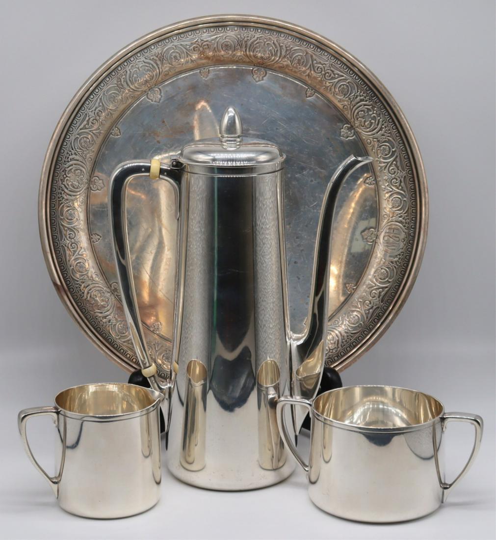 STERLING. Tiffany & Co. Sterling Hollow Ware.: Includes a 3 pc. Tiffany & Co. coffee service comprised of a coffee pot, creamer, and sugar - stamped to underside, "Tiffany & Co Makers Sterling Silver 22638 M". Accompanied by a Ti