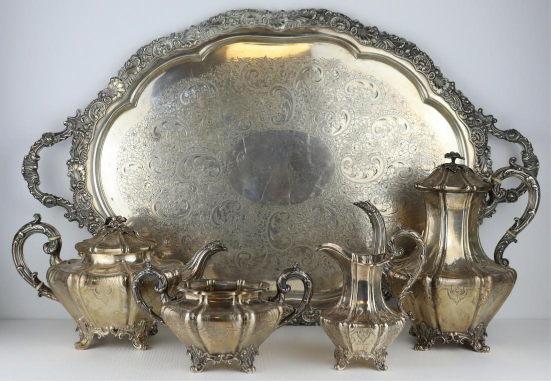 SILVER. 4 Pc. 19th C English Silver Tea Service.: Early 19th century English silver tea service comprised of a teapot, coffee pot, creamer and sugar. All pieces with scroll form feet and etched designs to body of vessels; floral form finials to lidde