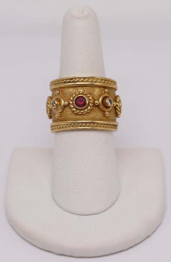 JEWELRY. Etruscan Revival 18kt Gold, Diamond and: Colored Gem Ring. Etruscan Revival 18kt yellow gold wide band ring set with (4) bezel set diamonds measuring approx. 1.5mm each, and (4) bezel set colored gems measuring approx. 2.5mm. Rope twist deta