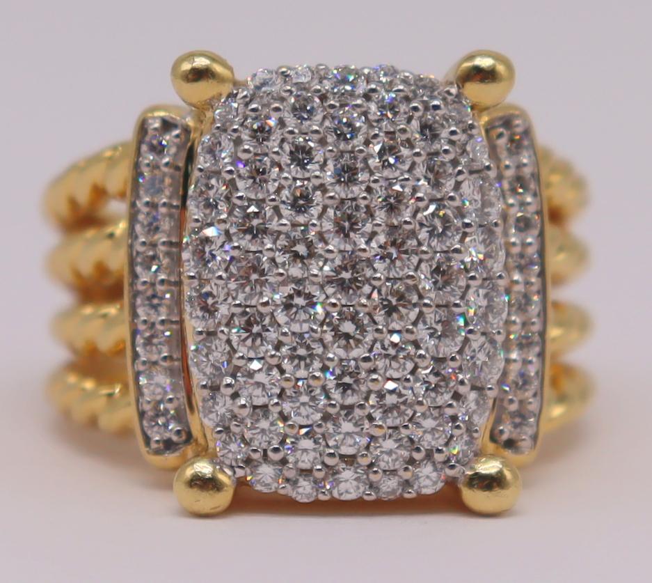JEWELRY. David Yurman 18kt Gold and Diamond Ring.: David Yurman 18kt yellow gold ring with central oval panel of round brilliant cut diamonds flanked by single rows of pave diamonds. With 4-band rope twist split shank. Total approx. weight is 9.6 dwt 