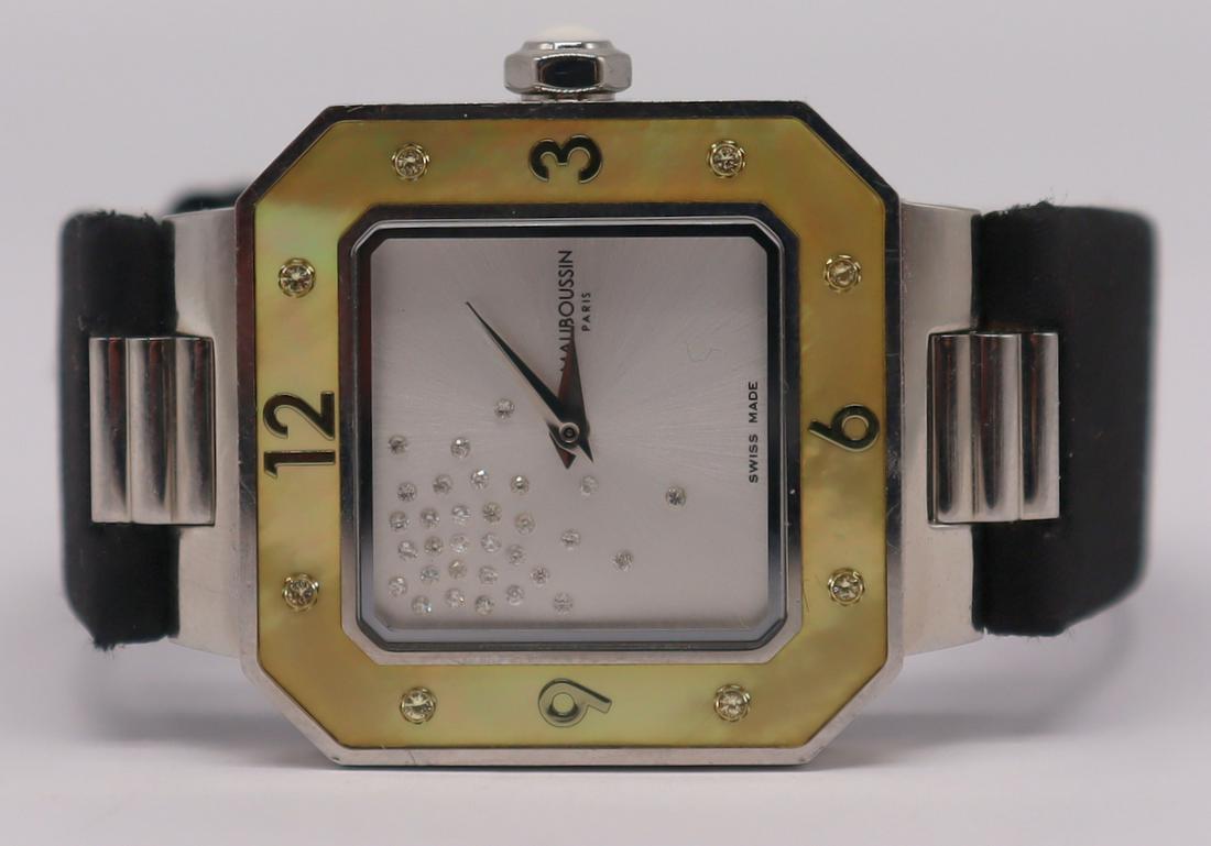 JEWELRY. Mauboussin Amour Le Jour Se Leve: Watch. Mauboussin Amour Le Jour Se Leve stainless watch case with mother of pearl bezel and (8) pave diamond accents. Underside of watch case inscribed, "Mauboussin Le Jour Se Leve Water Resistant 3AT