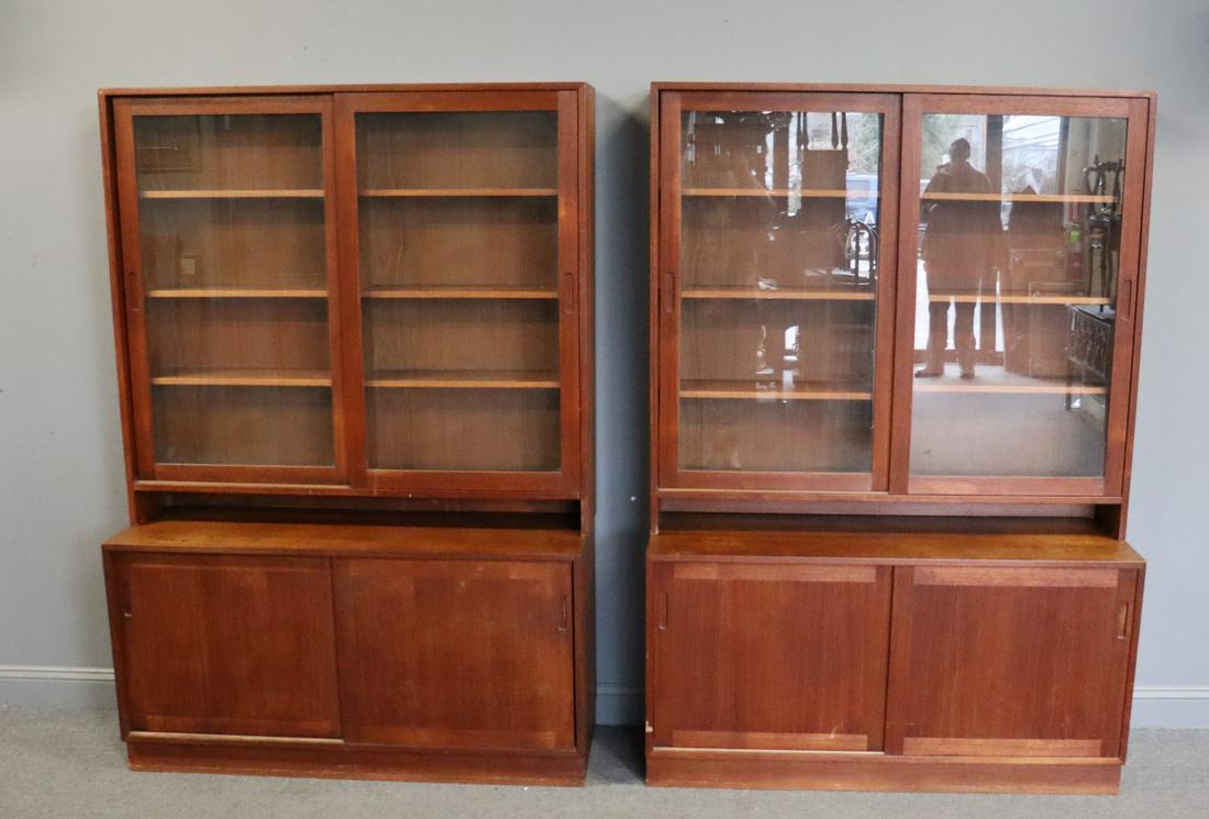 Midcentury. Pair Of Danish Teak Sliding Door: Cabinets . From a Central park West NYC estate . - Dimensions: 50.5" x 16.5" x 92.5"