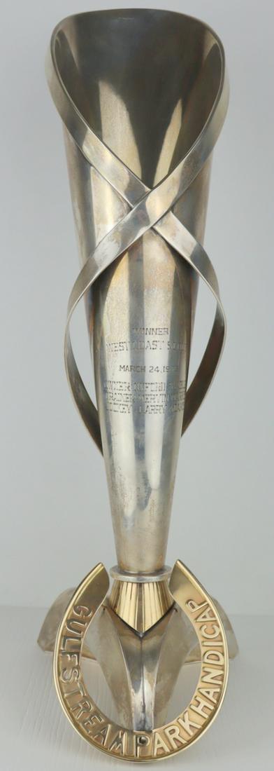 STERLING. Cartier Sterling Equestrian Trophy Cup.: Includes a Cartier sterling tapered trophy with banded 14kt yellow gold stem, and a most probably later applied 14kt yellow gold applied horseshoe. Trophy is inscribed, "Winner West Coast Scout March 