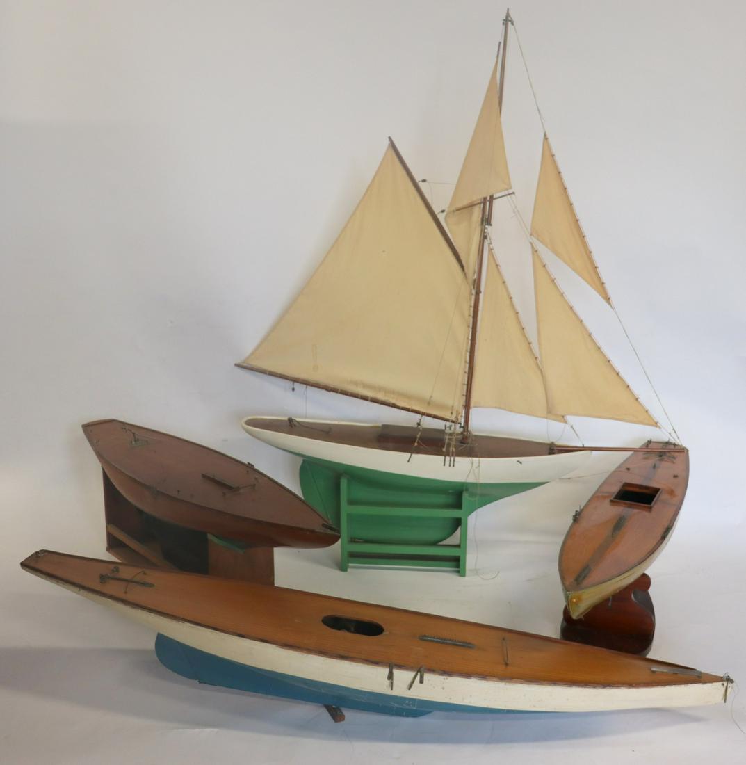 Lot Of 4 Antique Ship Models .: To inc a ship with sails and 3 hulls . From a Riverside CT estate .Measurements : 65", 49" , 51", 55"x 66"h