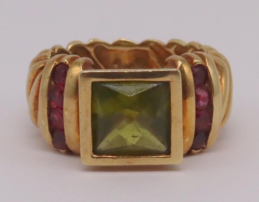 JEWELRY. David Yurman 14kt Gold and Colored Gem: Ring. David Yurman 14kt yellow gold ring comprised of a central bezel set Peridot? flanked by a total of (8) round faceted gems. Central gem measures approx. 7.0mm x 7.0mm; (8) round gems measure appr
