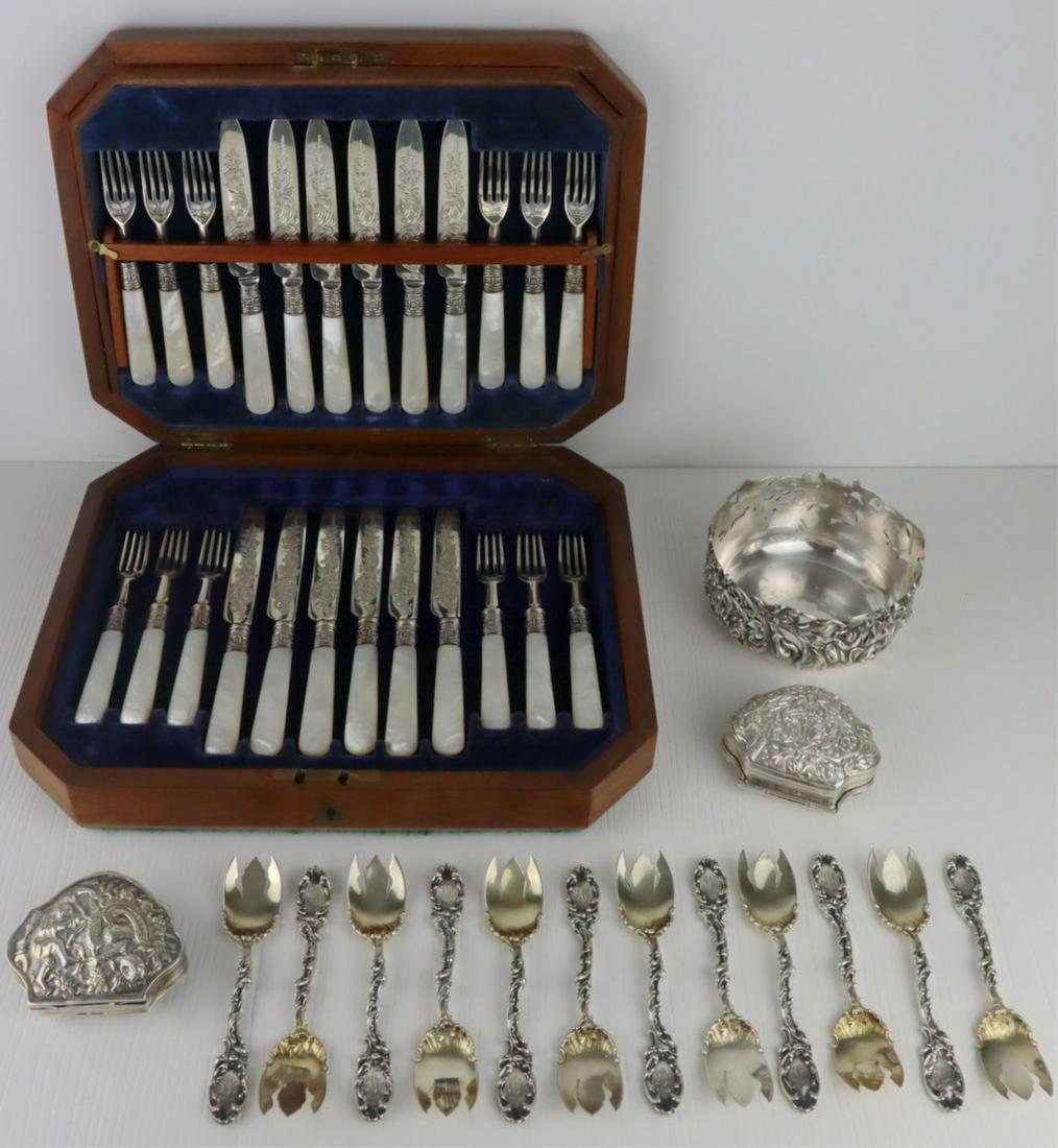 SILVER. Assorted Silver Grouping.: Includes (12) monogrammed Mauser sterling ice cream forks; a J.E. Caldwell & Co. sterling wine coaster with pierced floral and scroll design - stamped to underside, "J.E. Caldwell & Co 92