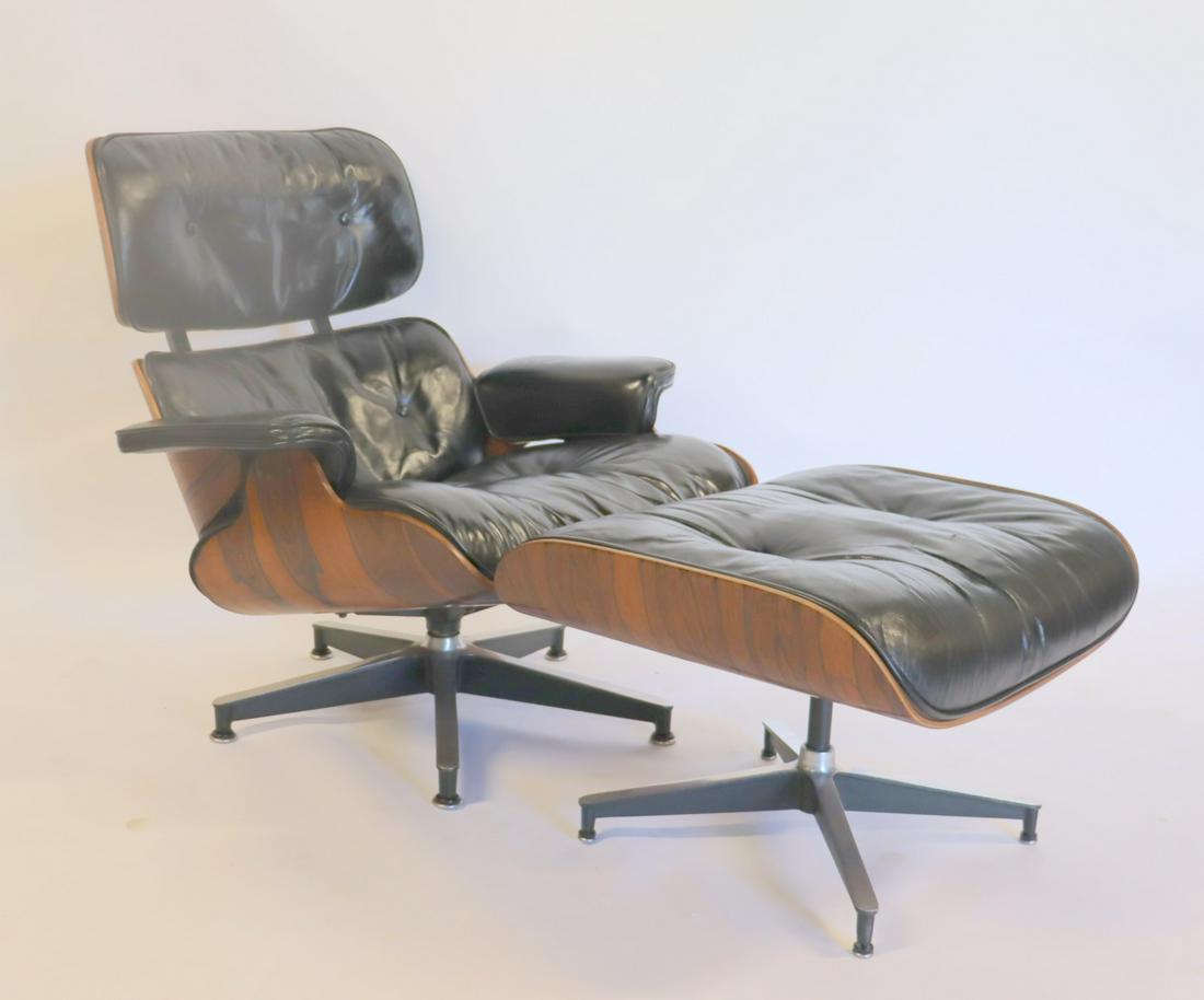 Charles And Ray Eames Midcentury Rosewood: Lounge Chair And Ottoman (17" h x 26" x 21"). Nice grain and patina on this original chair. From a Westchester estate. - Dimensions: Chair 33" x 34" x 34"
