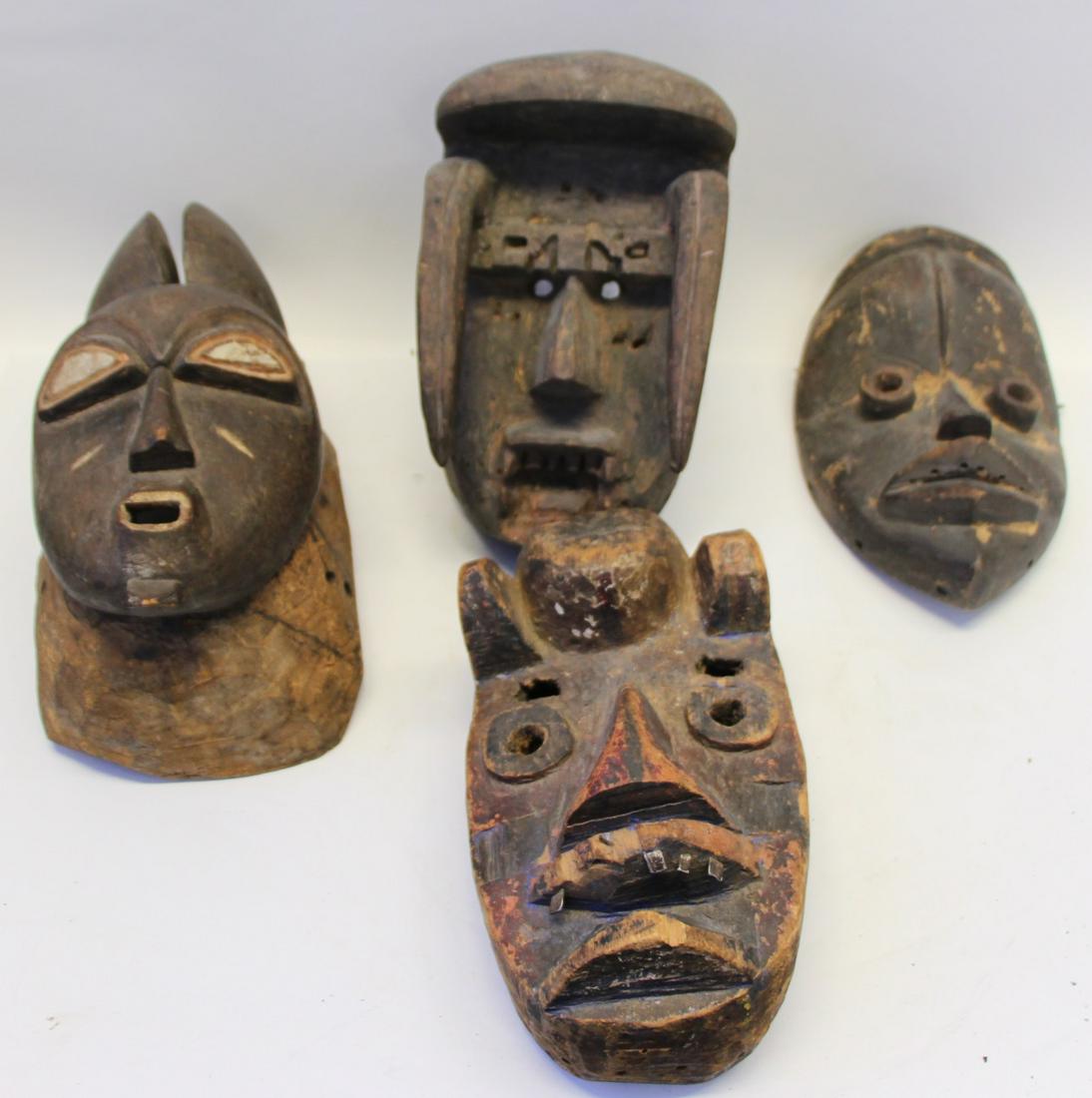 4 Antique Carved Wood African Masks. (1 of 12)