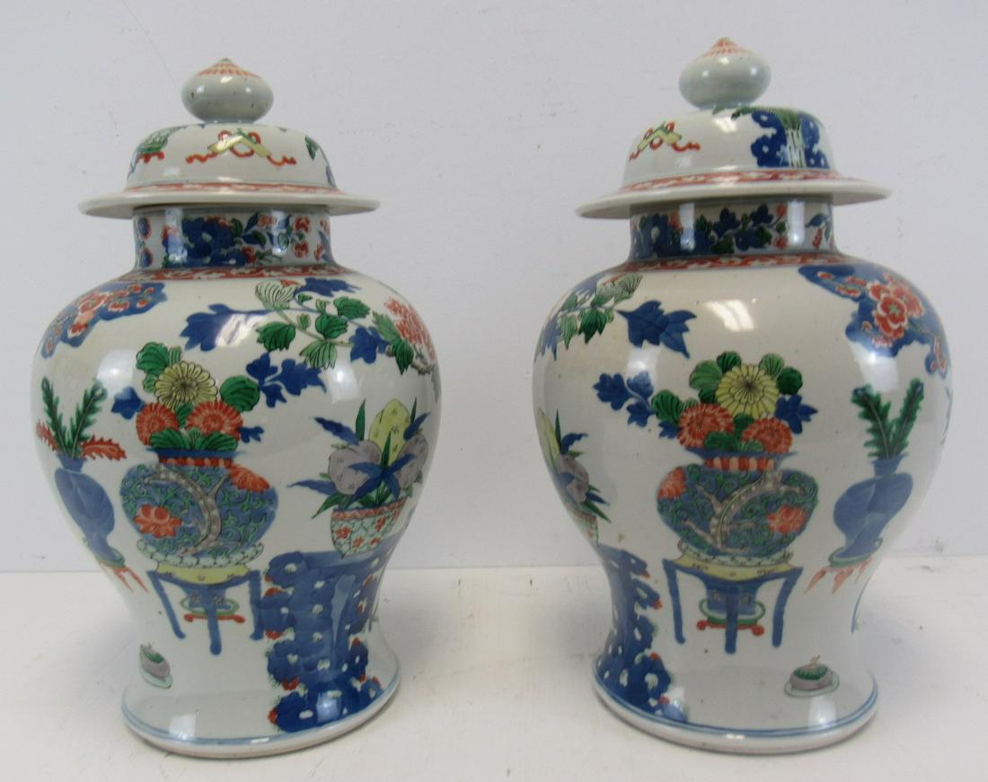 A Pair Of Chinese Enamel Decorated Lidded Jars (1 of 11)