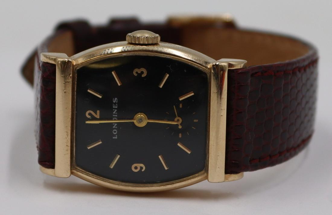 JEWELRY. Men's Vintage Longines 14kt Gold Watch.: Men's vintage Longines 14kt yellow gold watch face with black dial and subsidiary seconds dial. Stamped to interior of watch backing, "Longines-Wittnauer Watch Co. Inc. New York Geneva Montreal 1