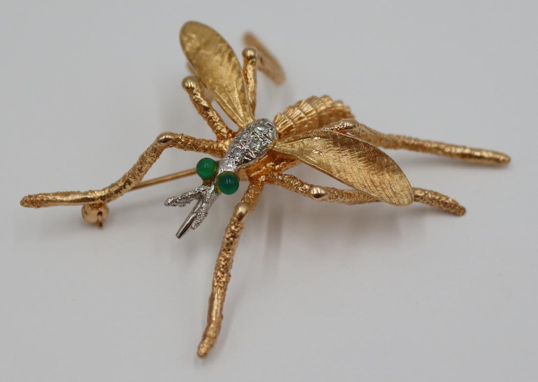 JEWELRY. Signed 14kt Gold, Colored Gem and Diamond: Bug Brooch. Signed 14kt yellow gold bug form brooch with wonderful textural finish, (4) single cut diamond accents, and green gem cabochon eyes. Stamped, "14K" with an unidentified pictorial