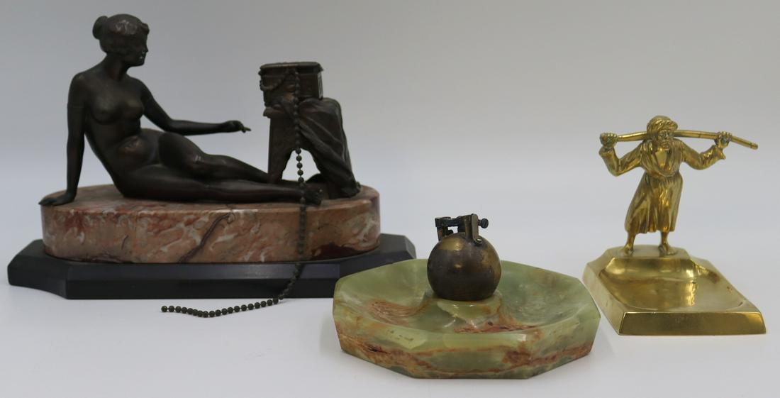 Assorted Decorative Tablewares.: Includes a reclining white metal female nude with a jewelry box on a rouge marble base; an Austrian Orientalist "vide poche" with a standing figure; and an alabaster ashtray with fitted cent