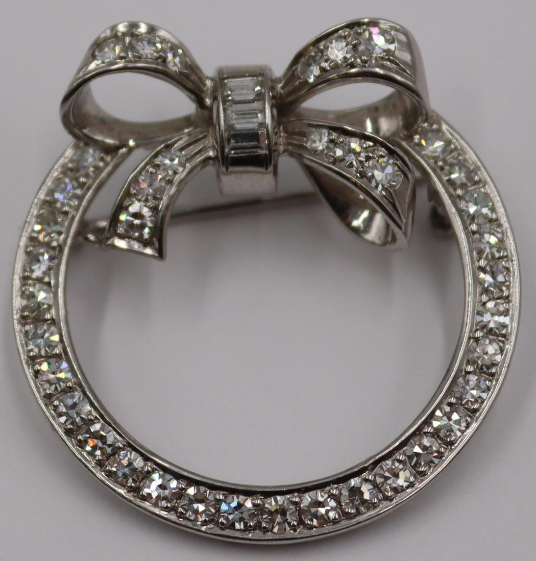 JEWELRY. Platinum and Diamond Wreath Form Brooch. (1 of 6)