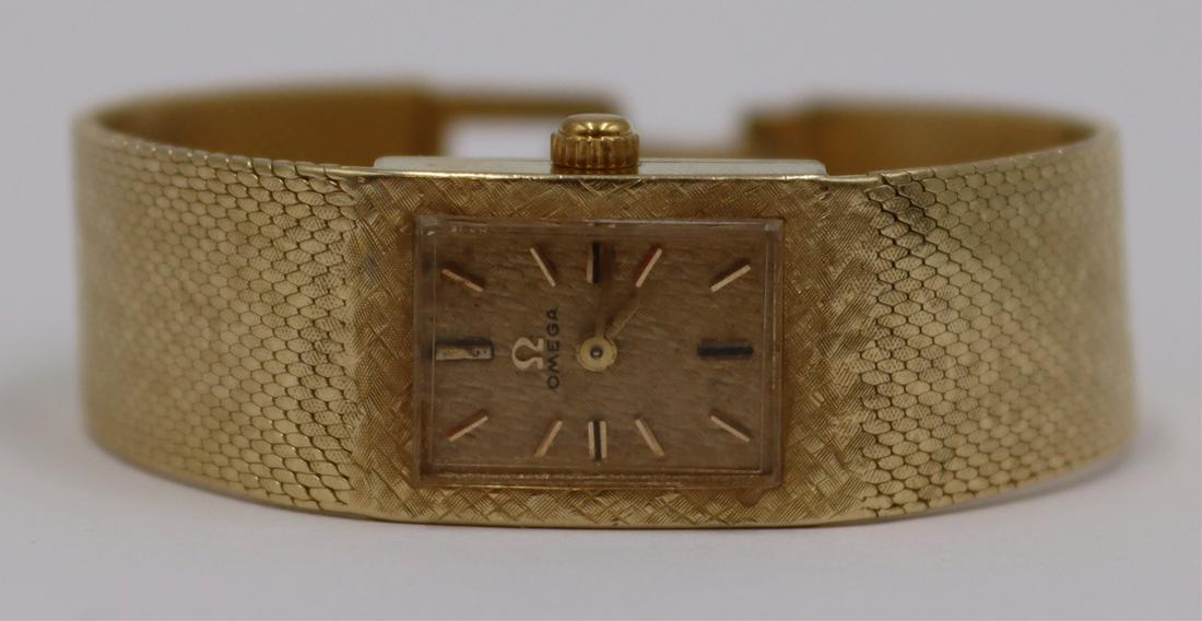 JEWELRY. Vintage Ladies Omega 14kt Gold Watch. (1 of 9)