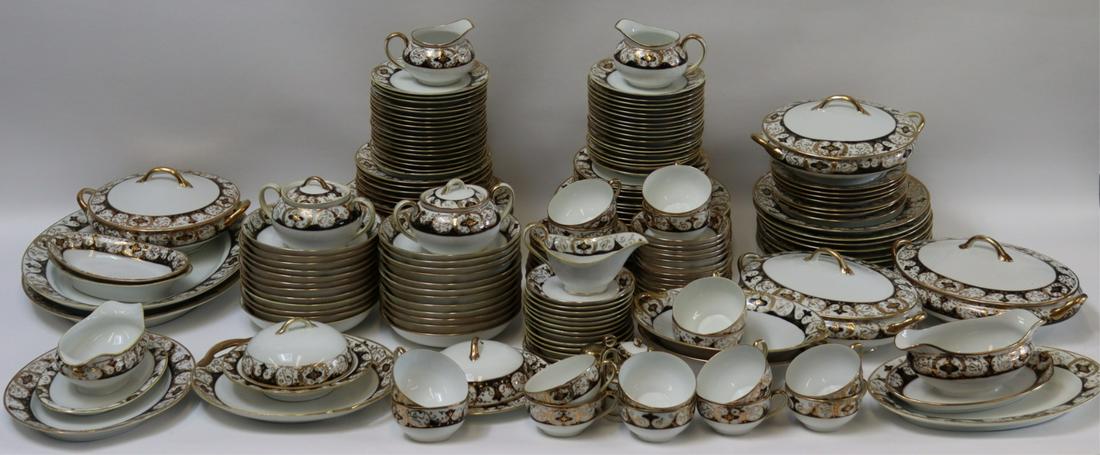 Large Grouping Of Noritake 20056 Gold Encrusted &: Black Decor Rim Chinaware. Comprised of (24) dinner plates - approx. 10" in dia; (24) salad plates - approx. 7 5/8" in dia; (36) bread & butter plates - approx. 6 1/4" in dia; (28) fruit/dessert (sauc