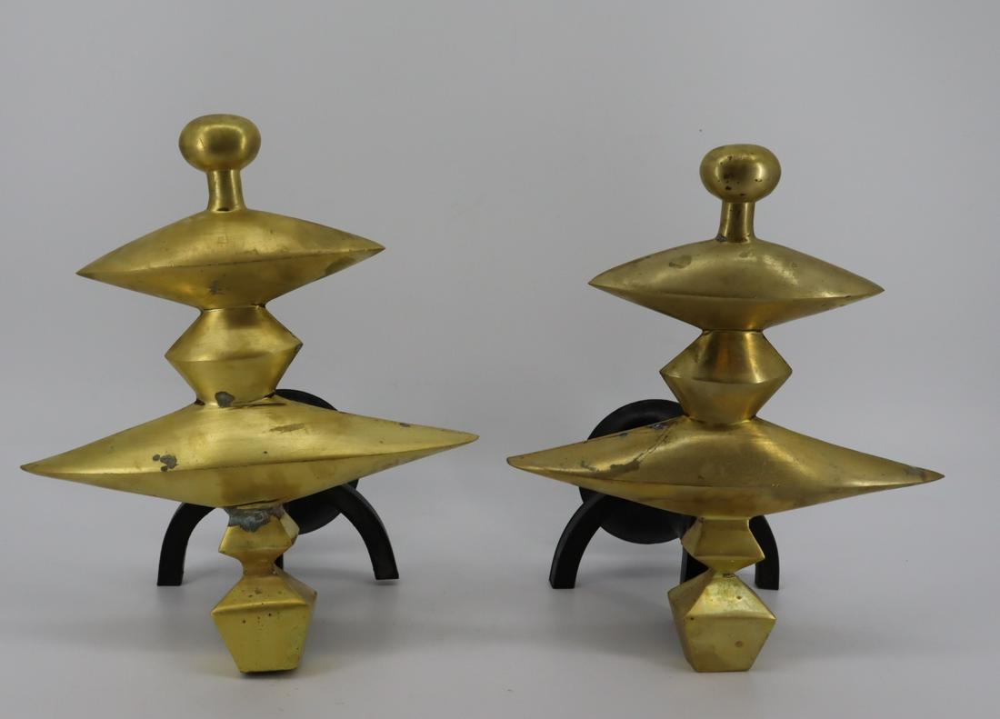 Pair Of Patinated And Gilt Decorated Giacometi: Style Andirons. From a New Jersey home. Dimensions: 13.5"H x 12" x 10" Condition: