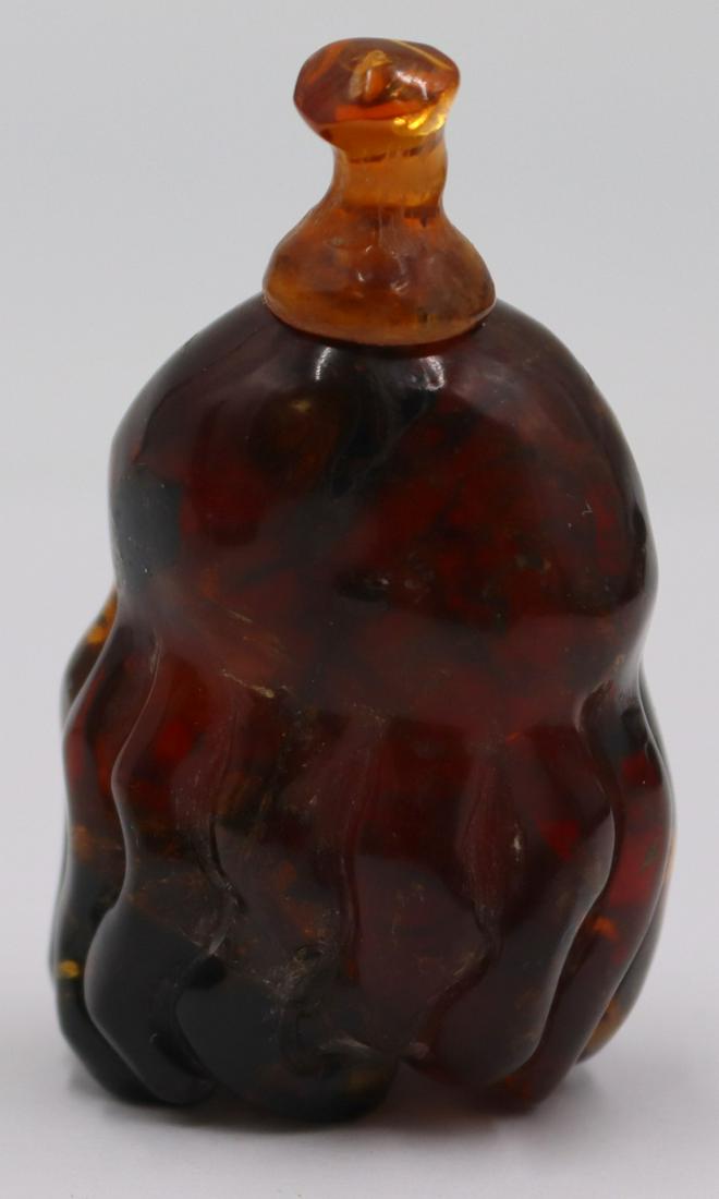 Carved Amber Buddha's Hand Snuff Bottle. (1 of 9)