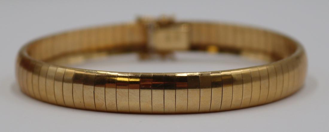JEWELRY. Italian 14kt Gold Omega Bracelet.: Stamped, "14kt Italy". Total approx. weight is 14.2 dwt (gross). From a White Plains, NY estate. Dimensions: bracelet measures approx. 0.30" in width with an overall length of approx. 7.375". Conditio