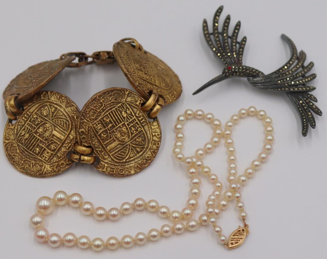 JEWELRY. Assorted Jewelry Inc Gold and Hattie: Carnegie. Includes a single graduated strand of individually knotted pearls with a 14kt yellow gold closure; a signed Hattie Carnegie medallion form bracelet - with plaque reading, "Hattie Carnegie";