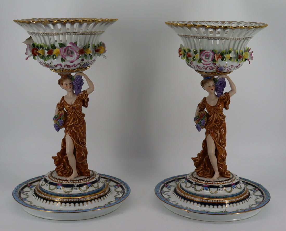 A Large Pair Of Limoges Figural & Reticulated: Porcelain Tazzas. From an Alpine New Jersey estate. Dimensions: 18.25" x 12" Condition: Good.