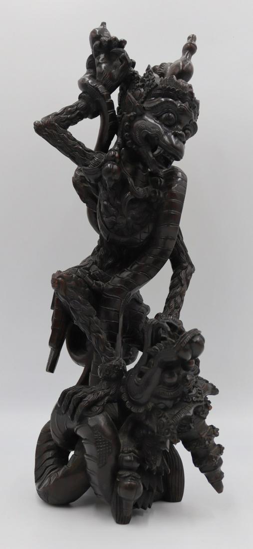 Signed Carved Balinese Figure of Garuda Fighting a (1 of 15)