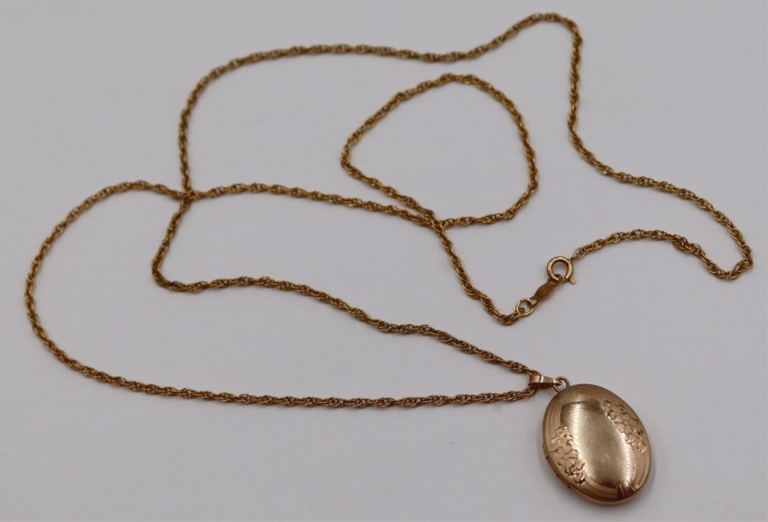 JEWELRY. 14kt Gold Locket and Chain Necklace.: Includes a 14kt yellow gold hinged locket with etched floral decoration suspended from a 14kt yellow gold chain link necklace. Total approx. weight of both locket and chain is 4.3 dwt (gross). From a 