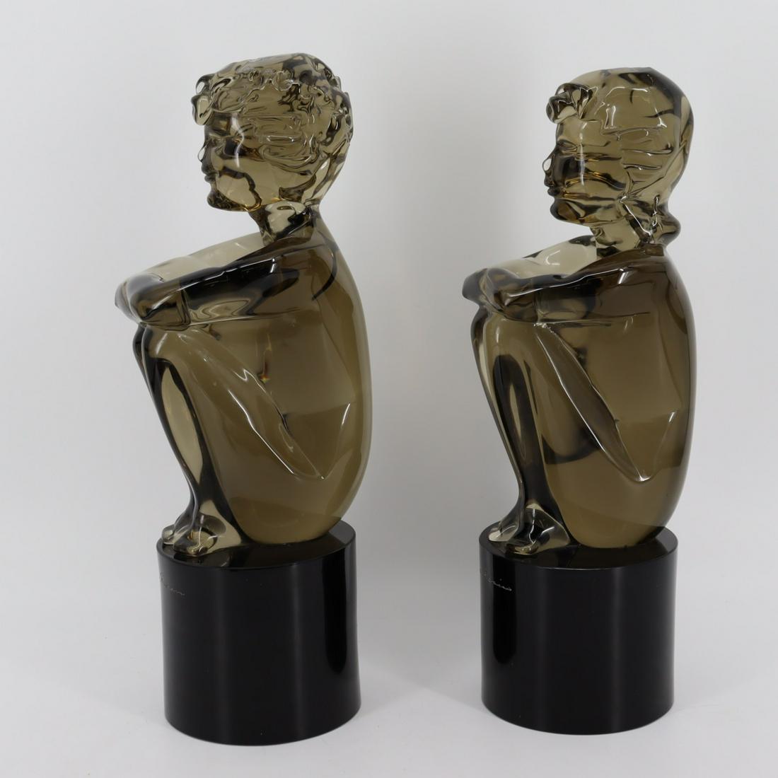 2 Loredano Rosin Signed Murano Glass Nude: Figures. A pair of Murano glass crouching nude figures signed by Loredano Rosin. Each executed in a smoked glass, each approximately 15.75" tall. - Dimensions: 16" & 16.5"